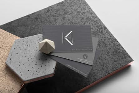 Kurt Houghton identity — card set on concrete